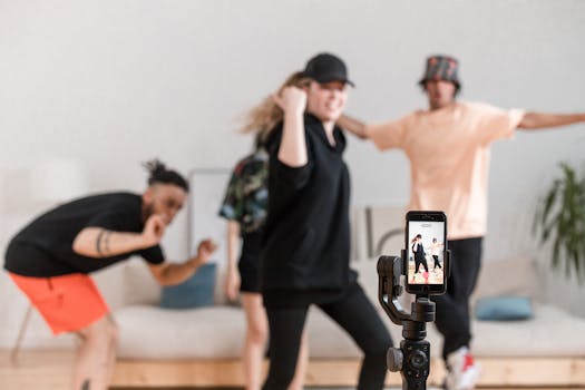 A diverse group having fun dancing for social media video content indoors.