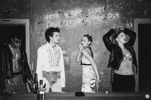 Group of friends enjoying a lively punk-themed night out at a bar.