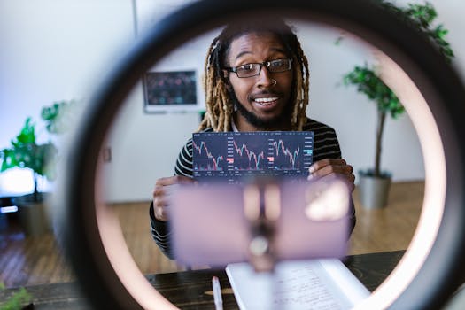 A man holds a cryptocurrency chart indoors, highlighting investment trends.