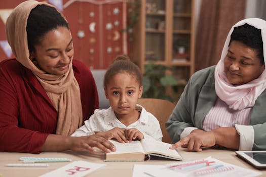 A family scene with a mother and grandmother teaching a young girl at home, showcasing education and cultural diversity.